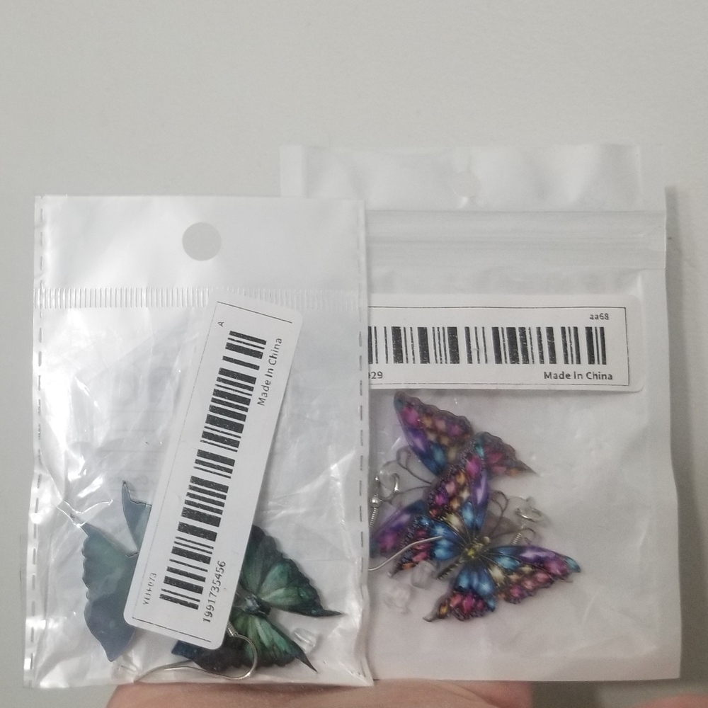 2 pairs of butterfly earrings